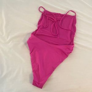 Pink open back one piece
